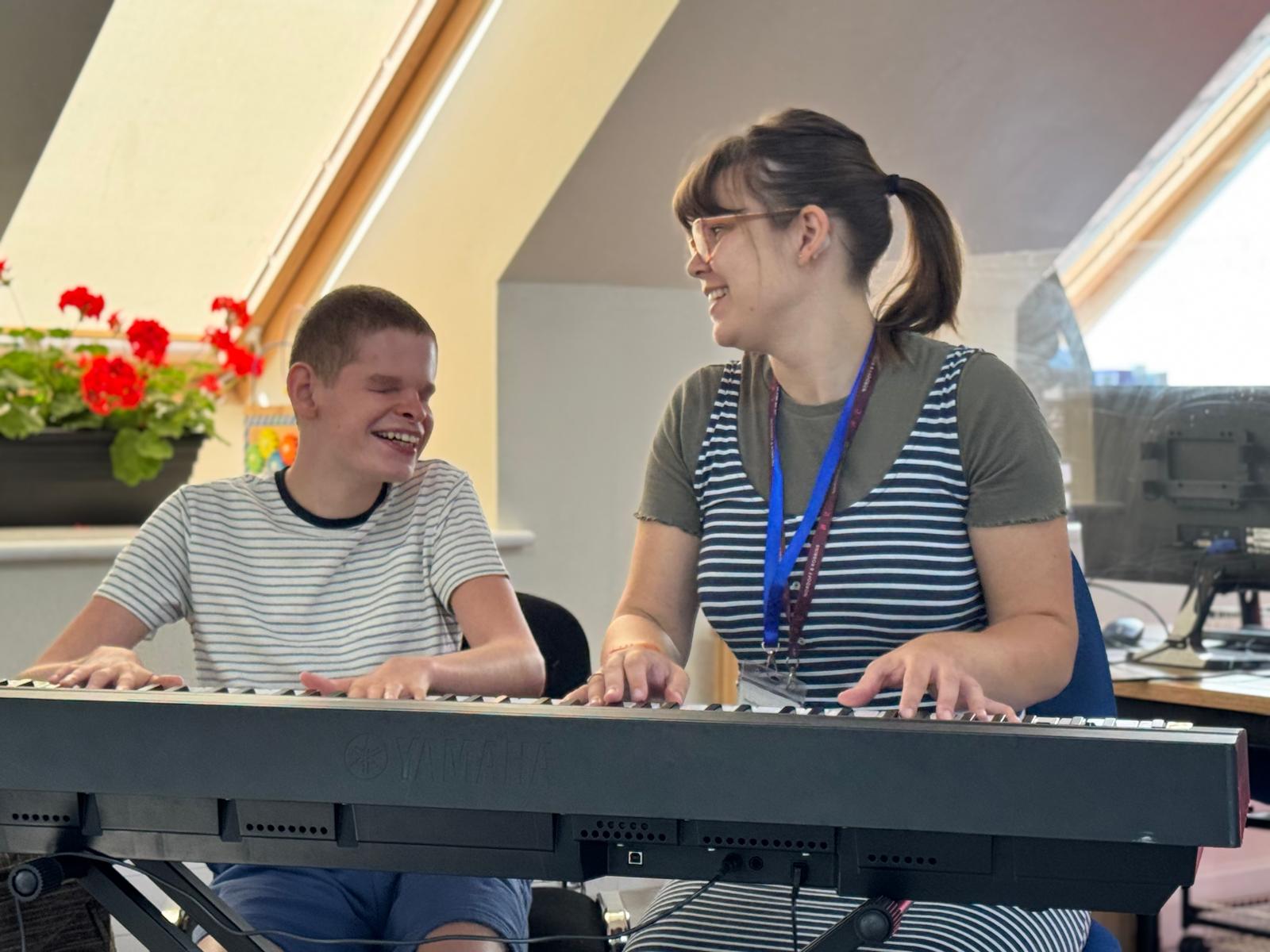 Liam in music therapy with Kathryn