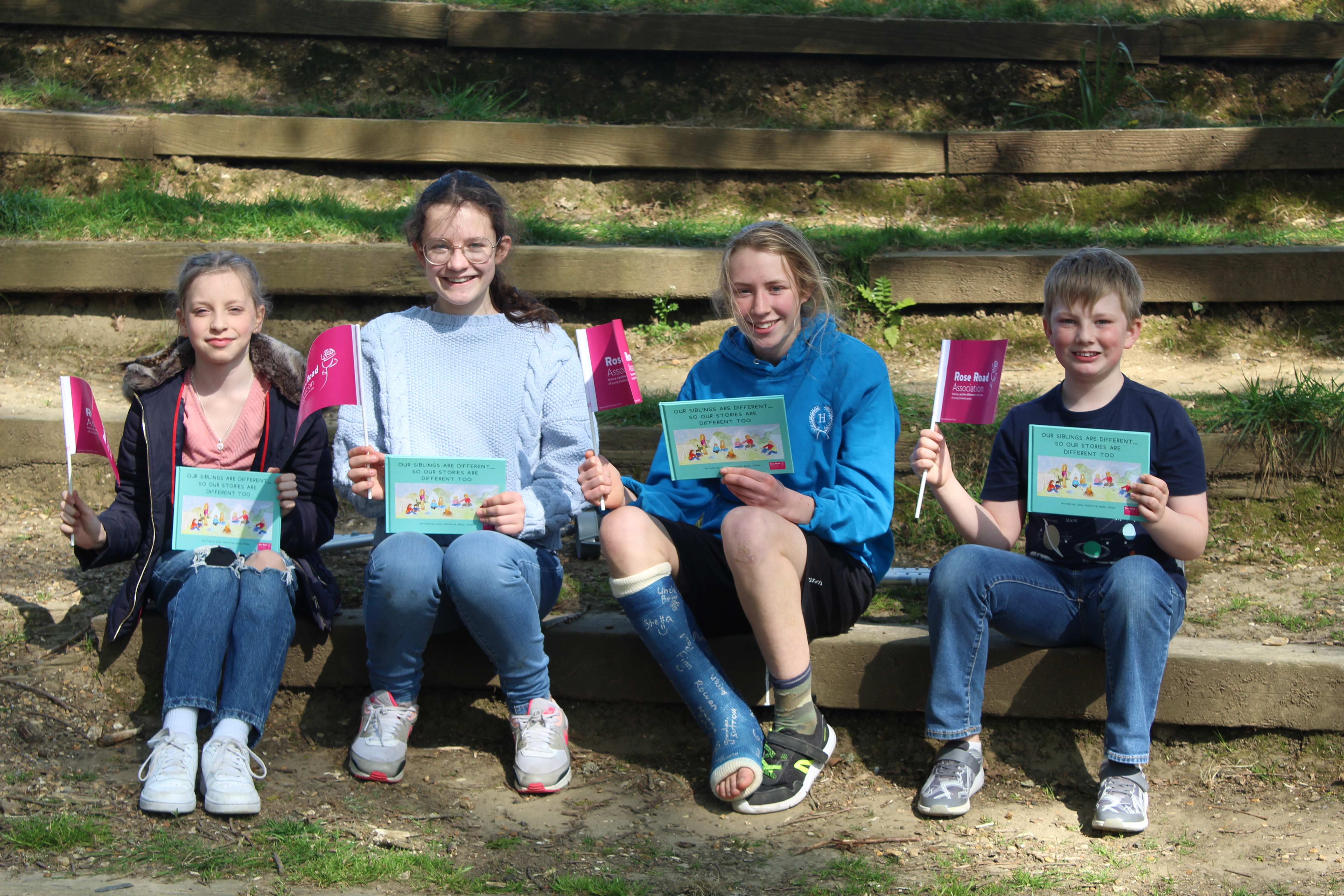 Siblings with book